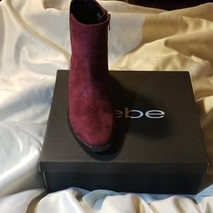 Brand new Bebe rhinestone booties in wine color